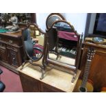 A XX Century Mahogany Dressing Table Mirror, with a shield shaped mirror, on swept legs together