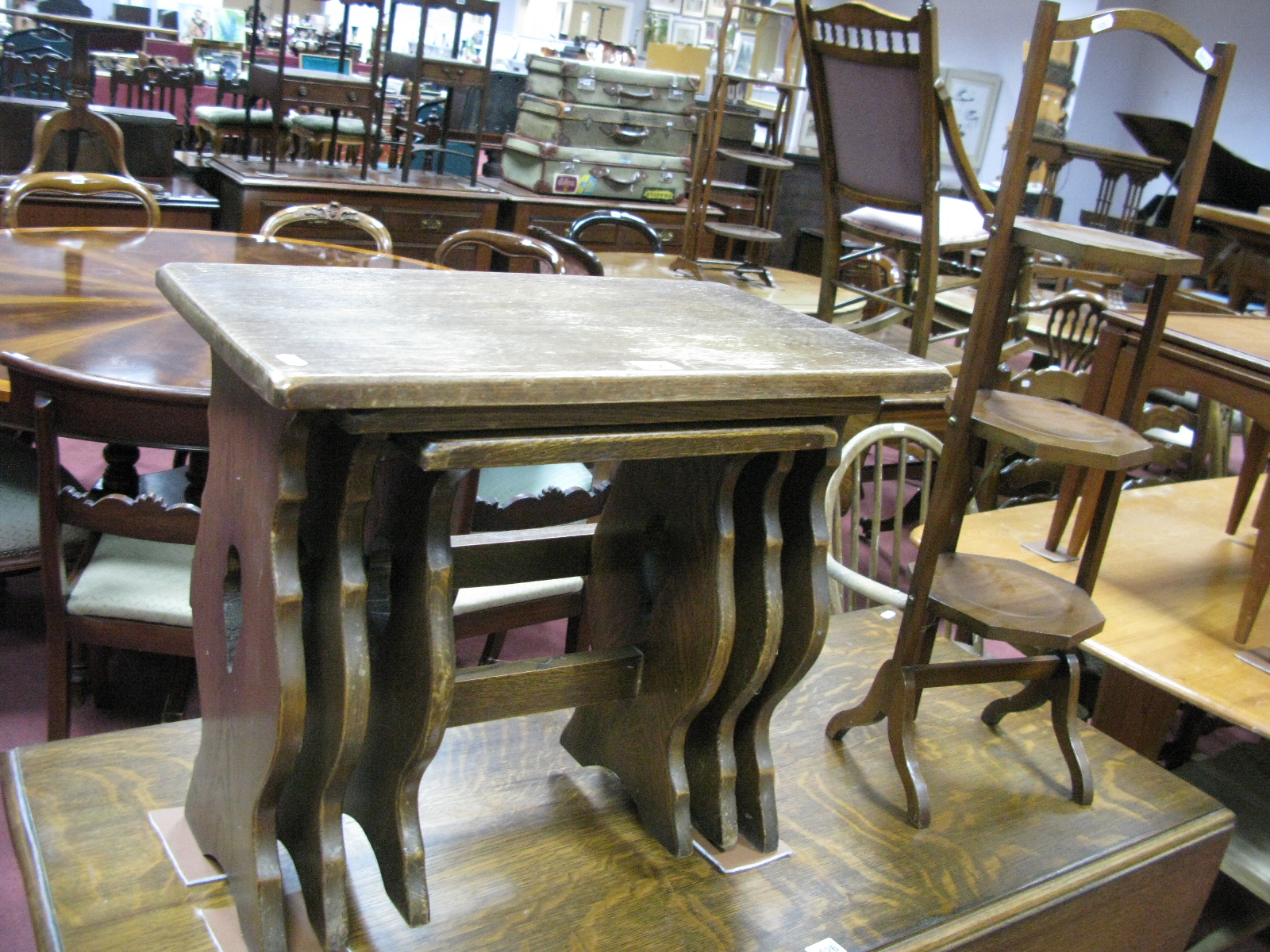 A Mahogany Three Tier Cake Stand , together with a oak nest of tables. (2)