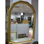 Gilt Wall Mirror, with angular top and shelf, arched leaded decoration.