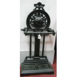 A Black Painted Metal Stick Stand, with 'Victory' and bust to back, detachable drip cups to base,