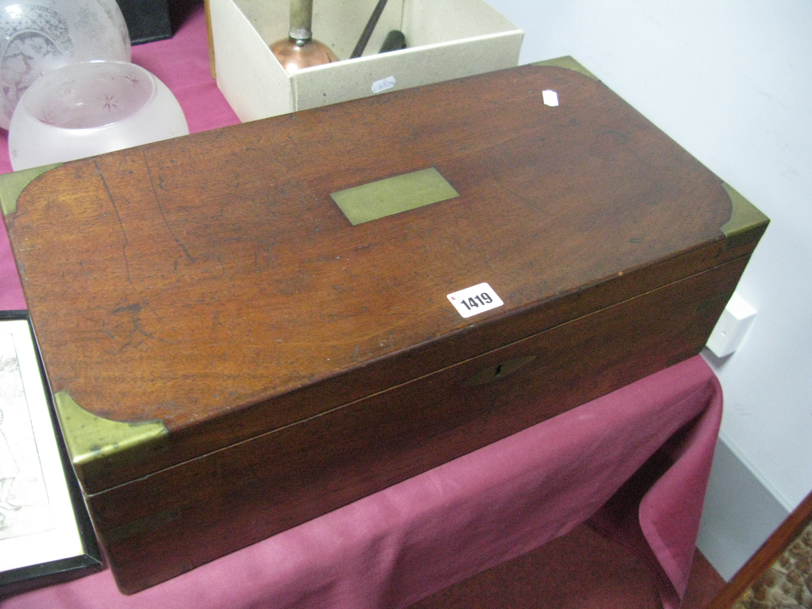 A XIX Century Mahogany Writing Slope With Fitted Interior, secret drawer, brass corner mounts,