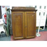 An XIX Century Oak Cupboard, with stepped pediment and inner shelves, another with glazed doors. (