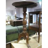 A XIX Century Pedestal Table, with circular top, moulded edge, turned pedestal, cabriole legs.
