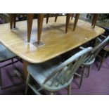 Ercol Light Ash Dining Table, with carved corners to rectangular top, on trestle supports, 152 x