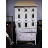 White Painted Dolls House, on chest of drawers, 85cm wide.