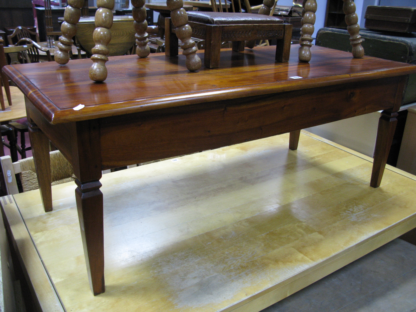 A Modern Hardwood Coffee Table, rectangular form, moulded edge, squared tapering feet.