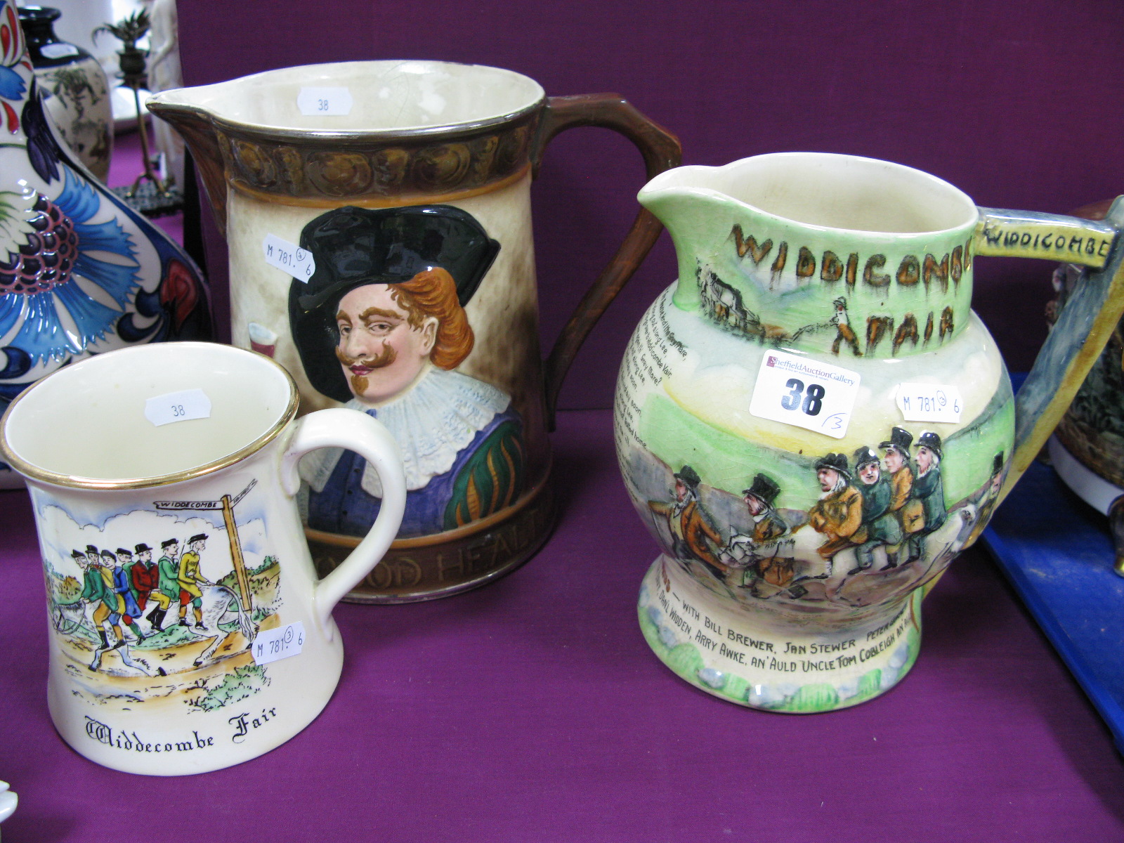 Crown Devon 'Widdicombe Fair' Musical Water Jug, similar tankard and cavalier jug.