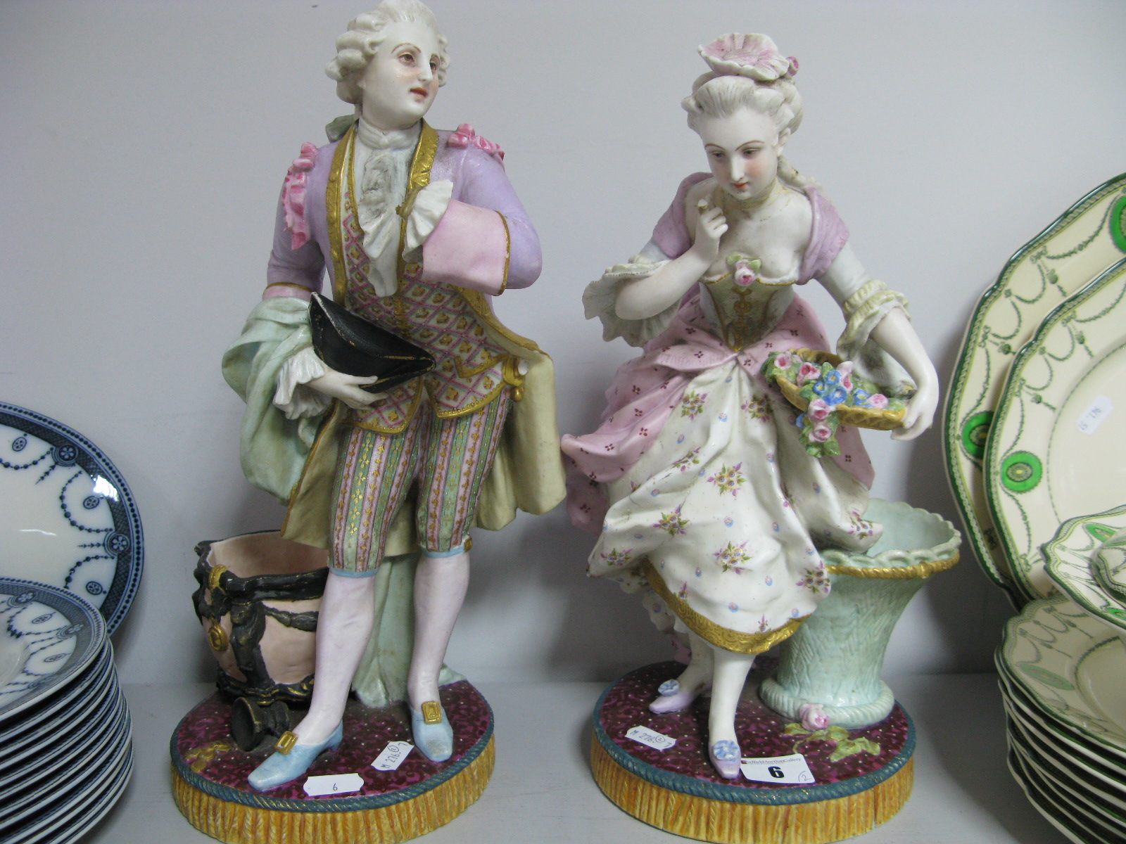 A Pair of XIX Century Continental Pottery Figurines,Regency Belle stamped L & M 35cm high (damaged)