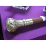A Contemporary Huntsman's Walking Stick with brass screw top revealing a clear glass tube with
