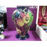 A Moorcroft Pottery Vase, painted in the 'Queens Choice design by Emma Bossons, , shape 65/9,