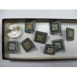 A Set of Seven Micromosaic Square Panel Buttons, detailed with flowerheads, with further matching