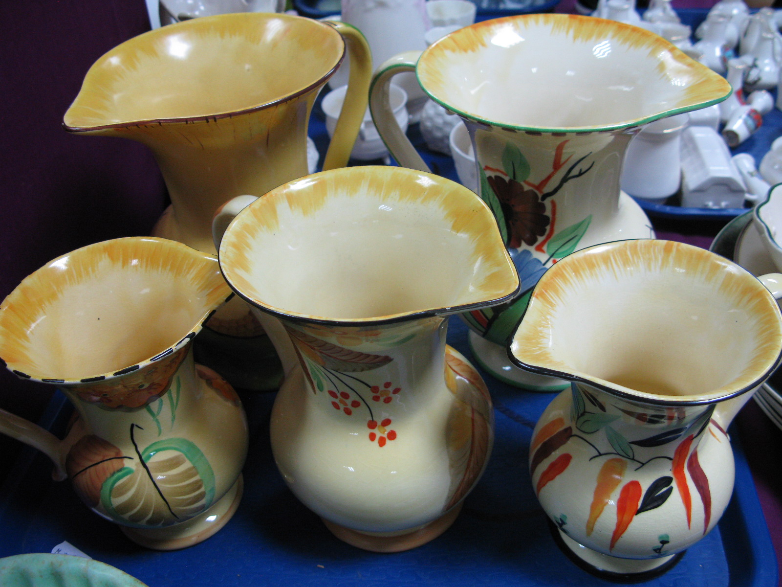 Five Crown Devon 'Eros' Jugs, circa 1930's.