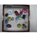 A Collection of Assorted Faceted Loose Stones.