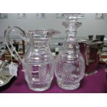 A Waterford Crystal Water Jug, with alternating plain and diamond cut panels and notched loop handle