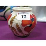A Moorcroft Pottery Vase, painted in the 'Harvest Poppy' design by Emma Bossons, shape 55/3,