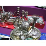 An Electroplated Four Piece Tea Set, of semi reeded form, an egg cruet stand, twin branch