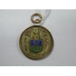 A 9ct Gold Medallion Pendant, with enamel highlights.