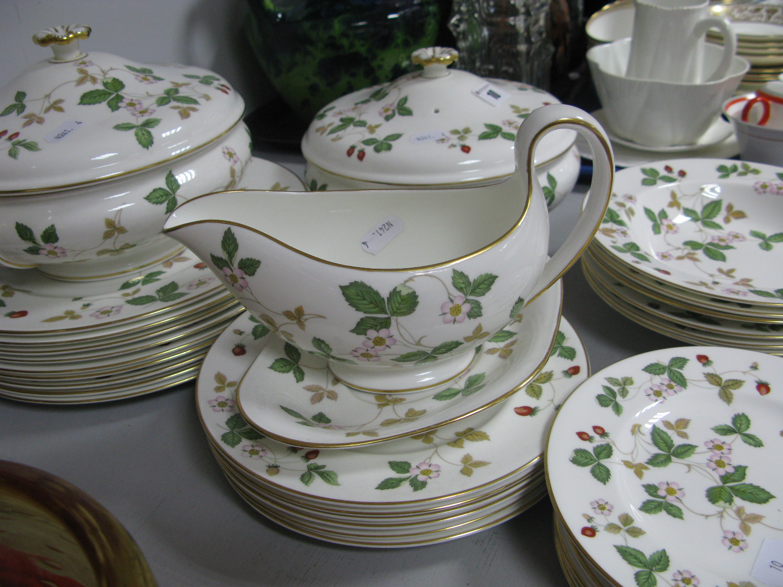 Wedgwood 'Wild Strawberry' Dinner Ware, of thirty pieces, comprising nine dinner, six dessert and