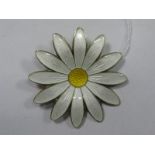 Aksel Holmsel; A Norwegian Enamel Daisy Brooch, highlighted in white and yellow enamel, stamped mak