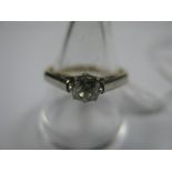 A Single Stone Diamond Ring, the old cut stone eight claw set between plain shoulders, stamped "