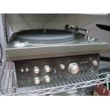 A Rotel RP - 3300 Servo Belt Driven Turntable, (portable appliance tested) and a Technics SU -