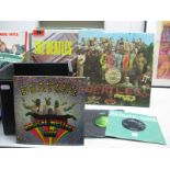 The Beatles : A Collection of LP's, 45's, EP's to include Please Please Me, Sgt Peppers, Rubber