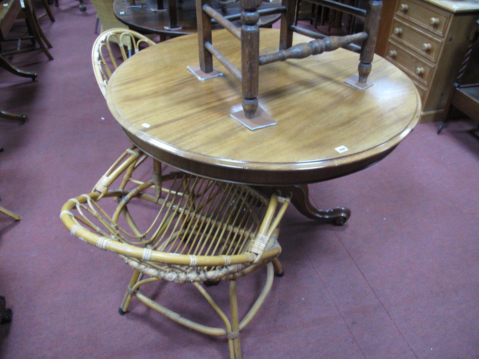 A XIX Century Mahogany Centre Table, with a circular top, bulbous pedestal on cabriole legs.