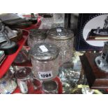 Three Hallmarked Silver Lidded Dressing Table Jars.