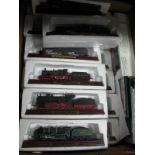 Twenty One Chinese Made Model Locomotives, on wooden bases.