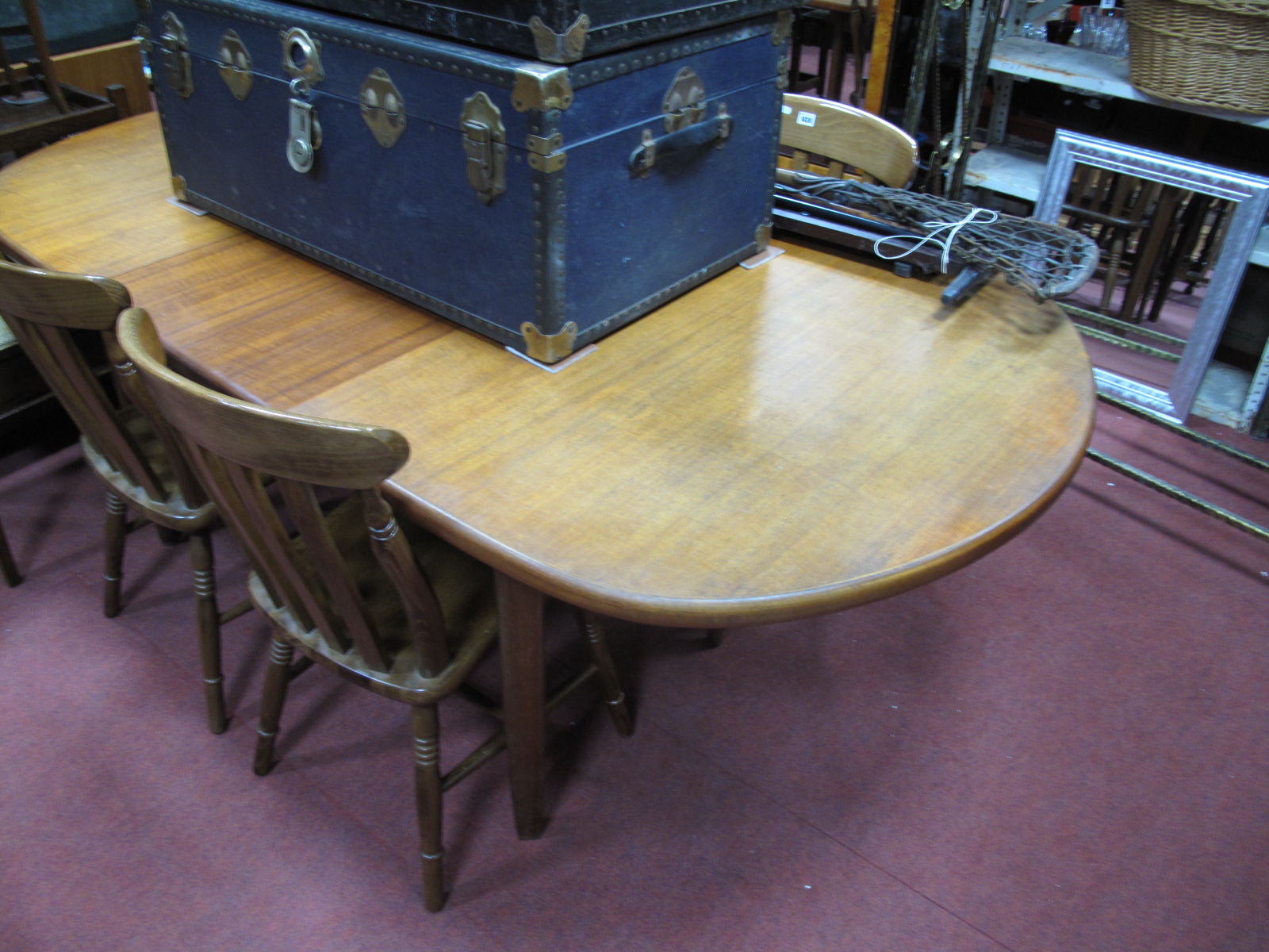 1960's Oval Shaped Teak Table, together with a set of four Ash kitchen chairs.