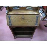 An Early XX Century Oak Bureau, with shaped gallery, Arts and Crafts oxidized copper strap hinges to