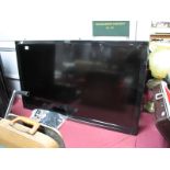 A Panasonic TXL42E3B Flat Screen TV plus Stand