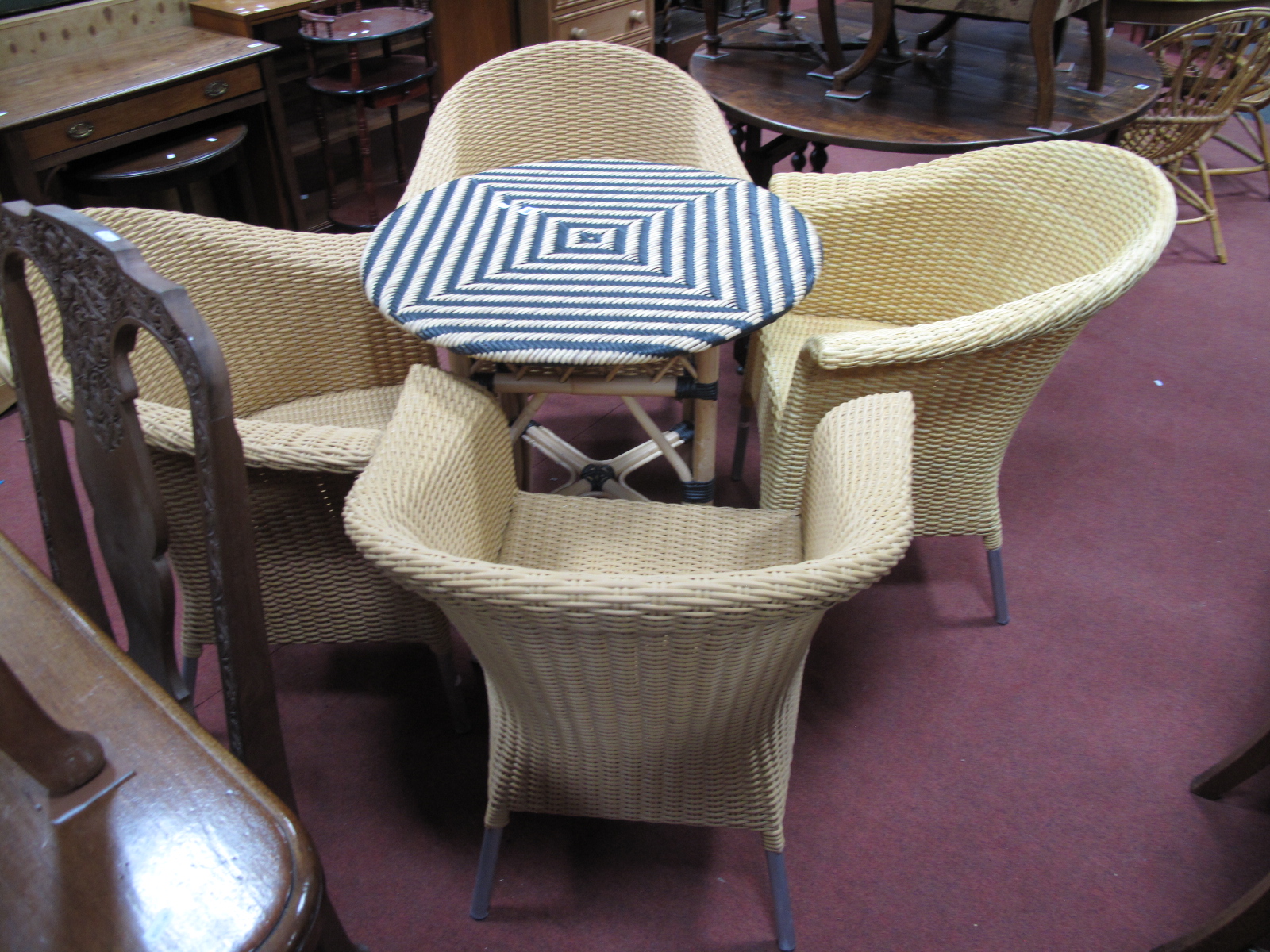 A Set of Four Conservatory Chairs, and matching circular table.