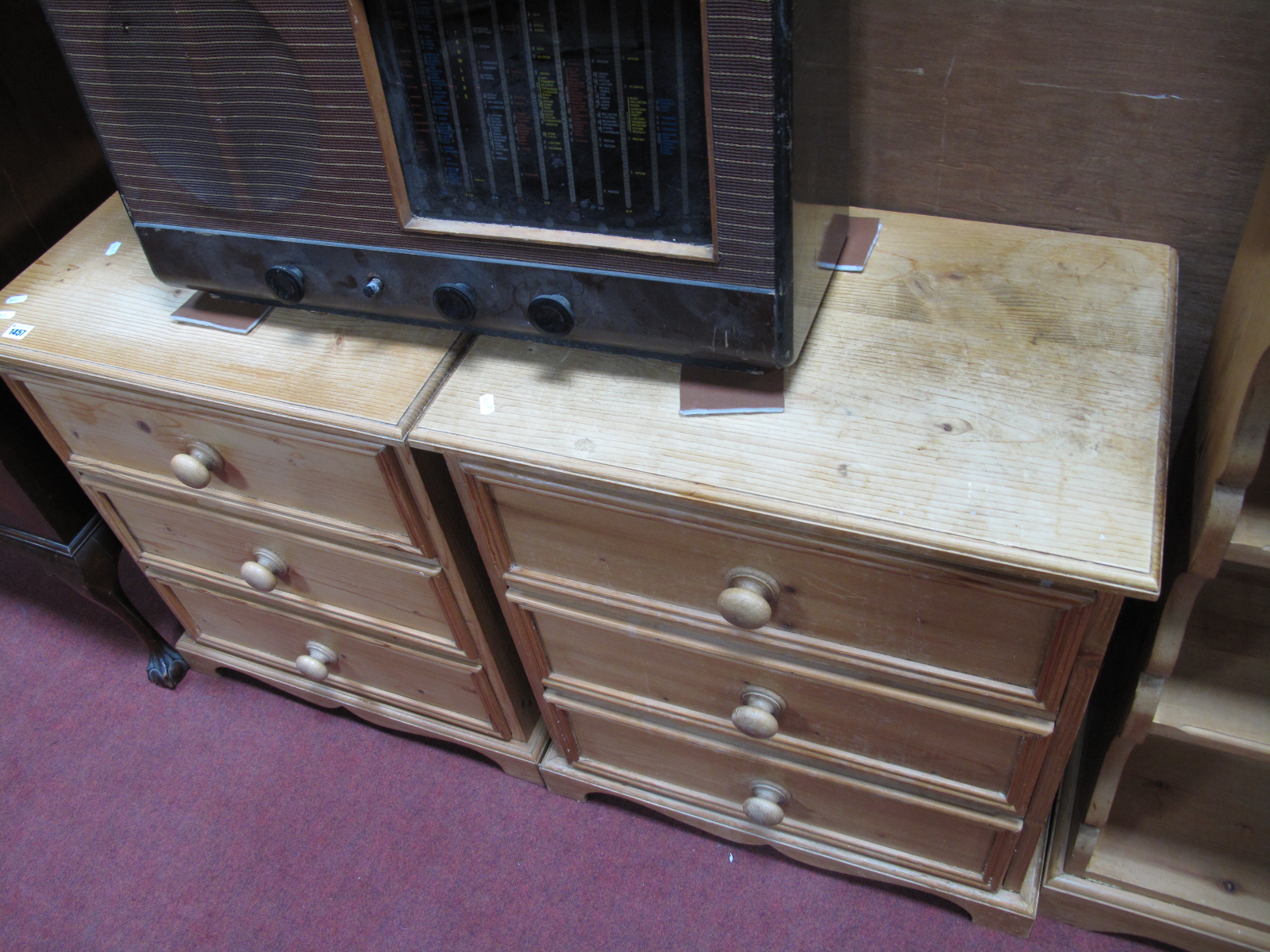 A Pair of Pine Three Drawer Chests, with turned handles.