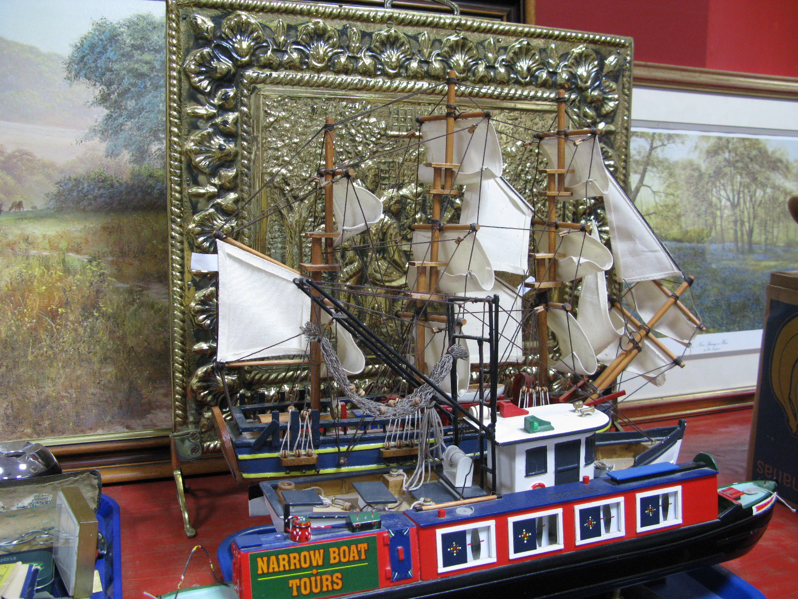 Three Model Vessels, brass fire screen, two prints.