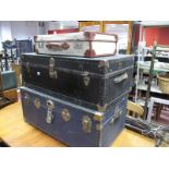 Two Mid XX Century Travel Trunks, and a canvas suitcase. (3)