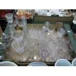A Star Cut Claret Jug, four XIX Century cut glass wines with baluster stems, custard glasses etc:-