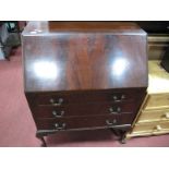 1930's Mahogany Bureau, a fitted interior, with brass plaque "Presented by his many friends to Mr