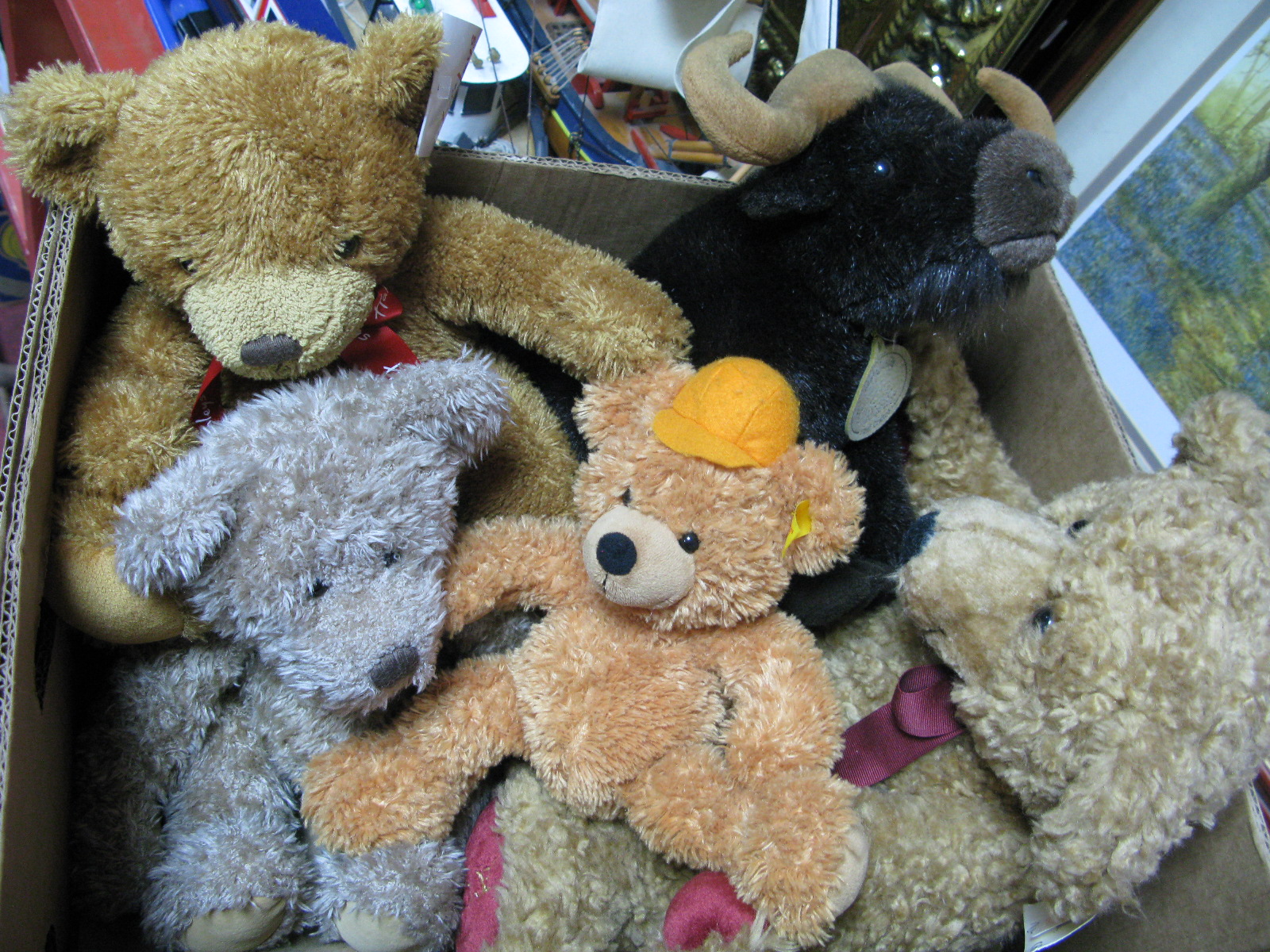 A Steiff Orange Plush Bear, Ross, Hamleys, Alton examples plus Aurora Bull.