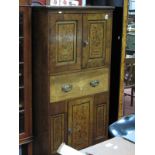A Walnut Cabinet, with inlaid cupboard doors, single inlaid drawers over a inlaid cupboard door on