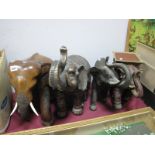 A Large Carved Wooden Elephant, 38cm high, plus three others. (4)