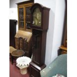 XX Mahogany Three Weight Grandfather Clock, with a brass dial, glazed door and plinth base.
