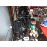 AICO De Lux 7 x 50 Field Binoculars; together with a figure of a boy. (2)