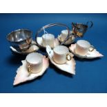 A c.Early XX Century Hukin & Heath Demitasse Set of Six Cups and Saucers, the blush ivory