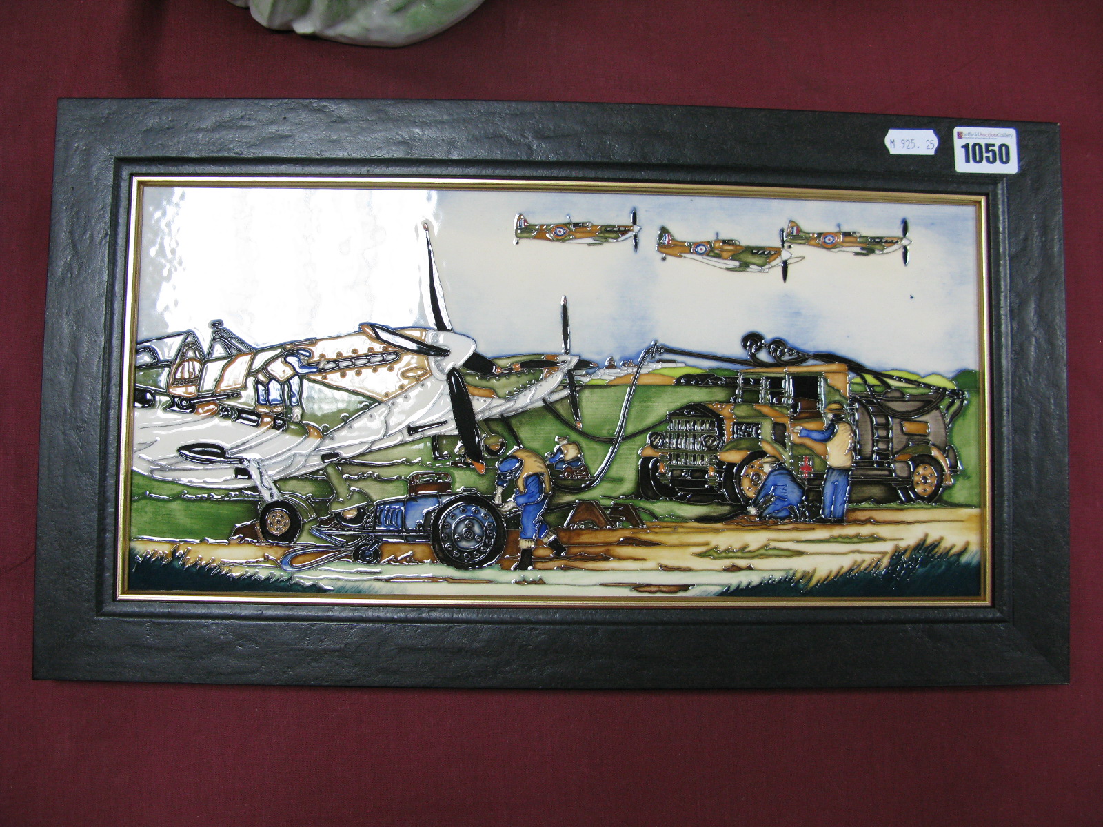 A Moorcroft Pottery Plaque, painted in the 'Prepare to Scramble' Pattern, designed by Paul Hilditch,