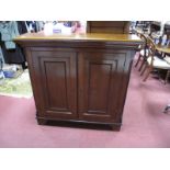 A Late XVIII Century Oak Boocase, with stepped pediment, panelled doors, fitted shelves, on