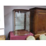 An Early XX Century Mahogany Bow Fronted Shop Display Cabinet, with two internal shelves, 91cm high,