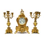 An Early XX century French Gilt Metal Three Piece Clock Garniture, the clock inscribed "A. Chapus,