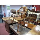 A XIX Century Ash and Elm Windsor Chair, with hooped back, pierced splat and rail supports, on