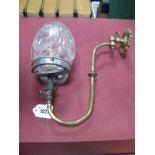 A Late XIX Century Gas Wall Lamp, the brass frame with gas tap and cut glass shade, 28.5cm long.